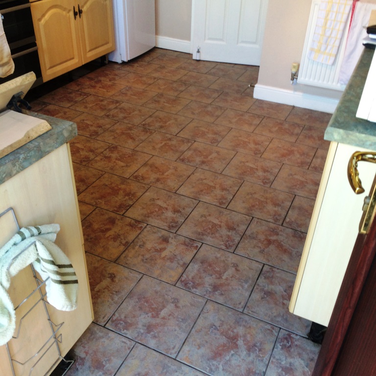 Heavily Soiled Ceramic tiled kitchen floor after cleaning Blaby