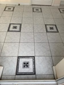 Ceramic Tiles with Carpet Adhesive Contamination After Cleaning Measham